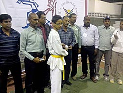 saad receiving silver medal at FKS Taekwondo Championship